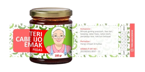 Desain stiker kemasan toples kaca Sambal Teri Cabe Ijo Emak Pedas, menampilkan ilustrasi karakter Emak yang ramah dan sistem informasi produk yang lengkap.