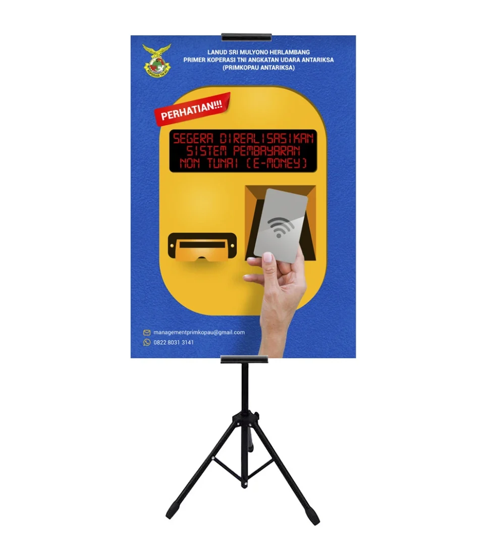 Desain standing banner sosialisasi e-money Lanud Sri Mulyono Herlambang PRIMKOPAU Antariksa Bandara SMB II Palembang menampilkan informasi transisi pembayaran non-tunai.